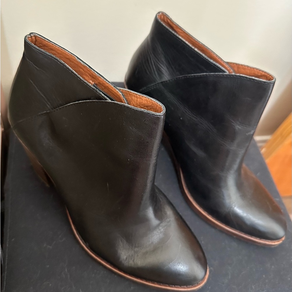Black leather ankle booties with heel